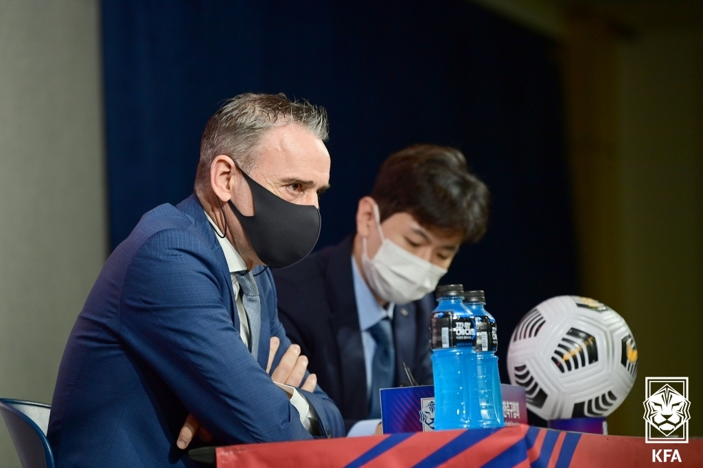 Paulo Bento (L), head coach of the South Korean men's national football team, speaks at a press conference at the Korea Football Association (KFA) House in Seoul on Monday, in this photo provided by the KFA. (KFA)