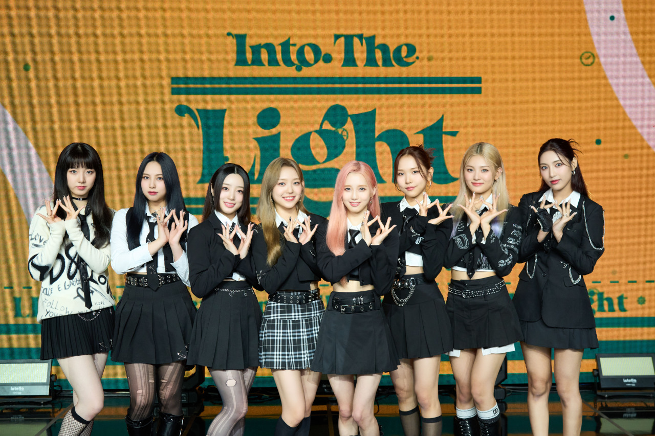 Members of K-pop girl group Lightsum pose for pictures during the act’s first EP “Into the Light” press conference conducted on Tuesday in Seoul’s Blue Square. (Cube Entertainment)