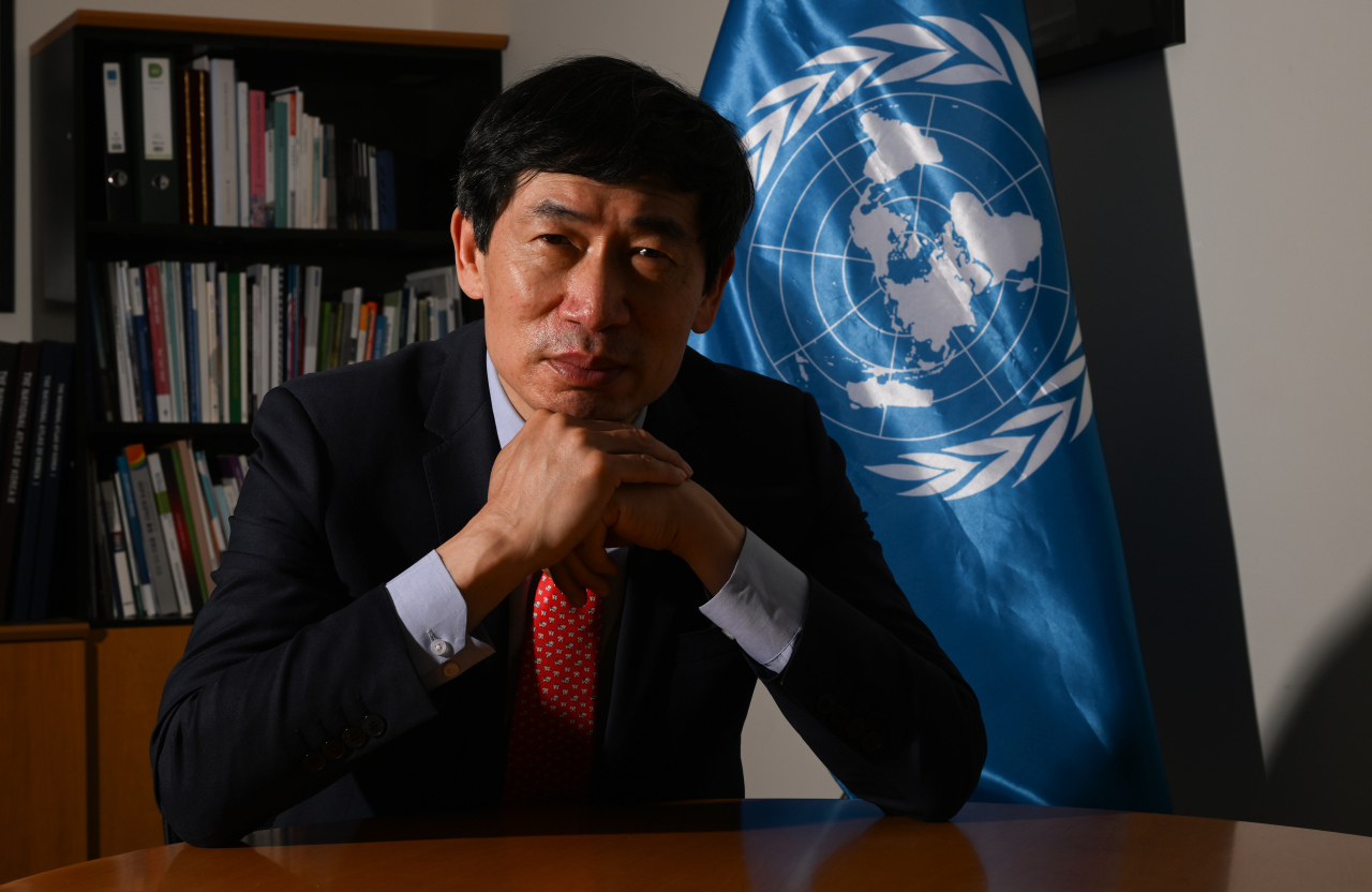 UN Assistant Secretary-General and Director of the UNDP Bureau for Policy and Programme Support Haoliang Xu poses during an interview with The Korea Herald in Seoul on May 24. (Im Se-jun/The Korea Herald)