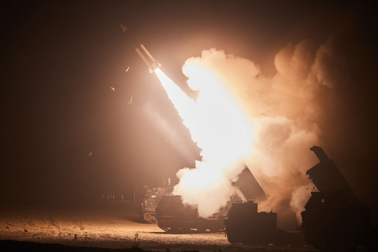 South Korea and the United States hold joint missile firing drills at an unspecified location on June 6, 2022, in this photo released by the Joint Chiefs of Staff. (Yonhap)