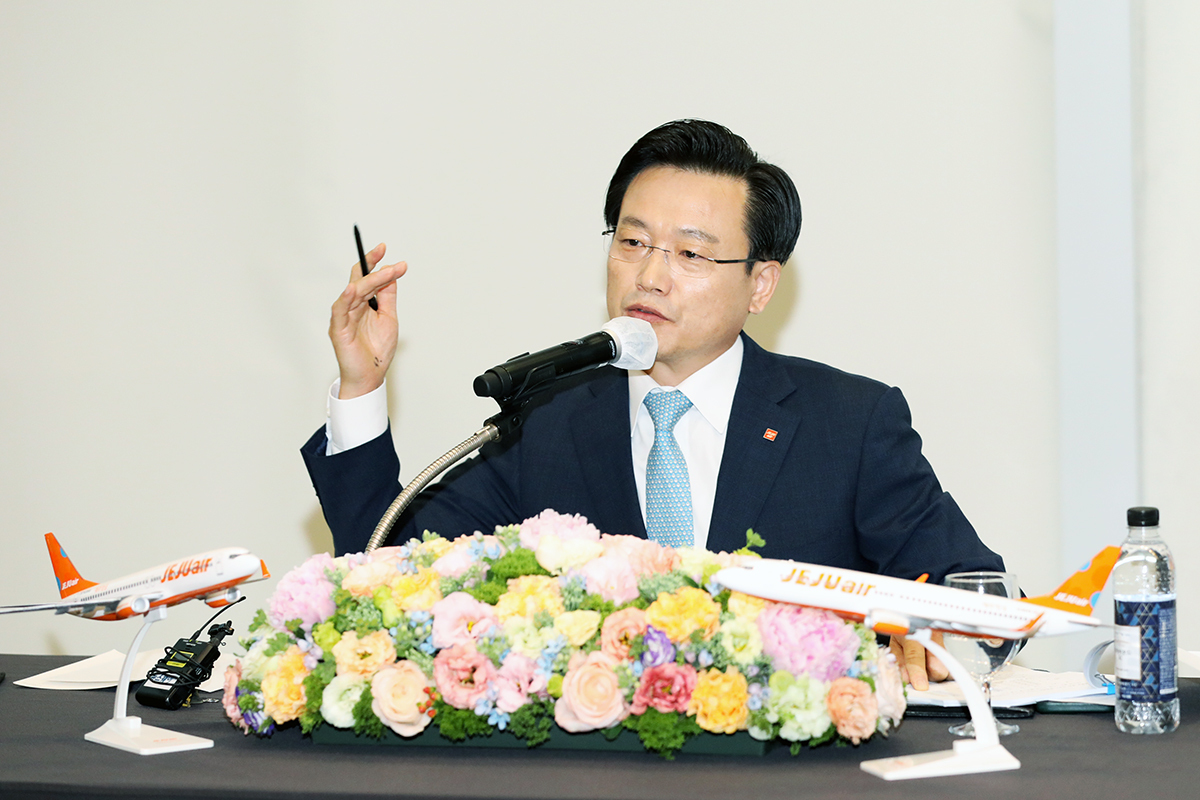 Kim E-bae, CEO of Jeju Air, holds a press conference Tuesday with local reporters. (Jeju Air)