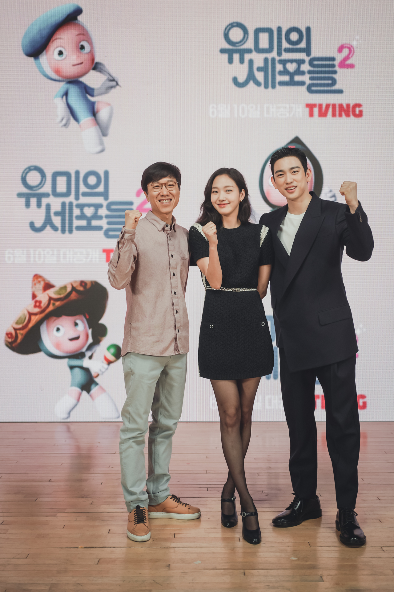 From left: Director Lee Sang-youb and actors Kim Go-eun and Jinyoung of GOT7 pose for photos before an online press conference Tuesday. (Tving)