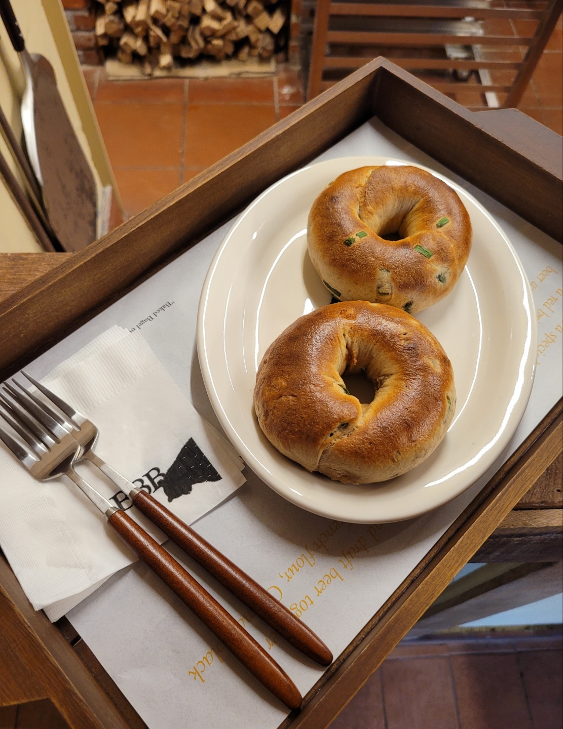 The onion chives bagel is among the eight different bagel varieties at BBB. (Park Yuna/The Korea Herald)