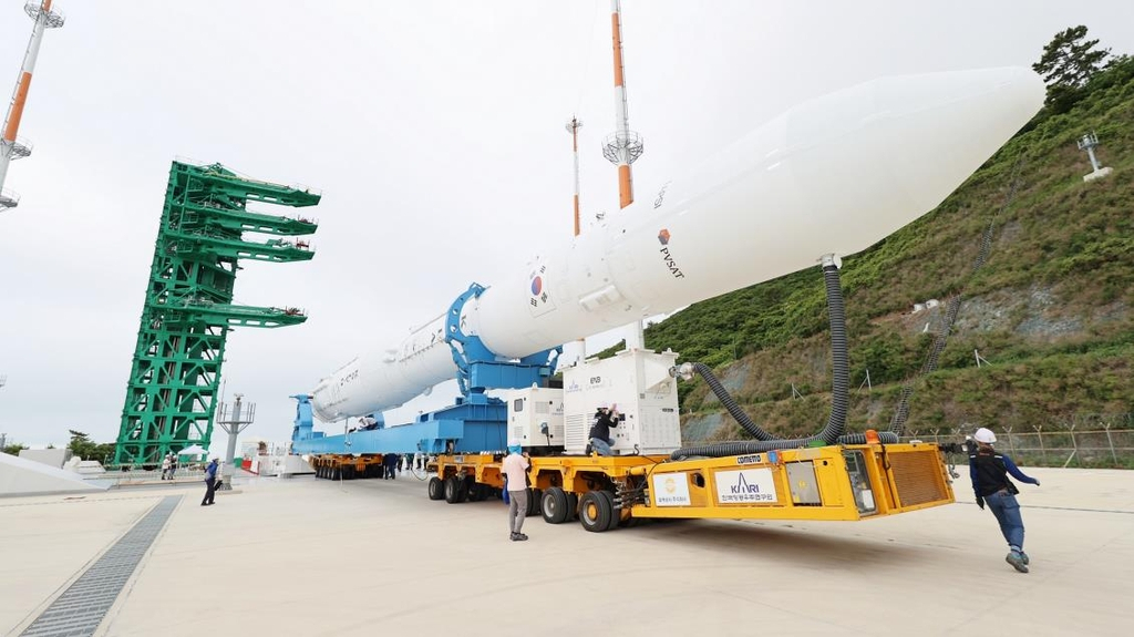 This photo provided by the Korea Aerospace Research Institute on Wednesday shows South Korean space rocket Nuri being transported to the launch pad at Naro Space Center in Goheung, some 470 kilometers south of Seoul. (Yonhap)