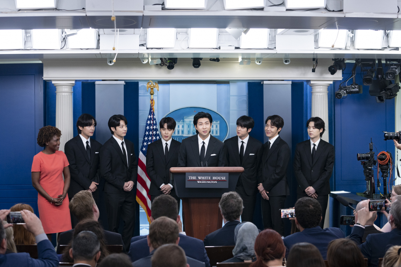 This photo, provided by Hybe, shows the members of K-pop sensation BTS speaking at the briefing room of the White House in Washington on May 31, 2022, prior to their meeting with US President Joe Biden to discuss anti-Asian hate crimes. (Yonhap)