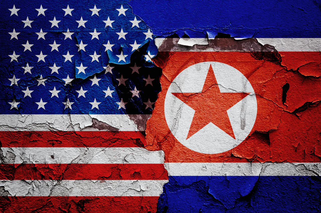 US (left) and North Korean flags. (123rf)