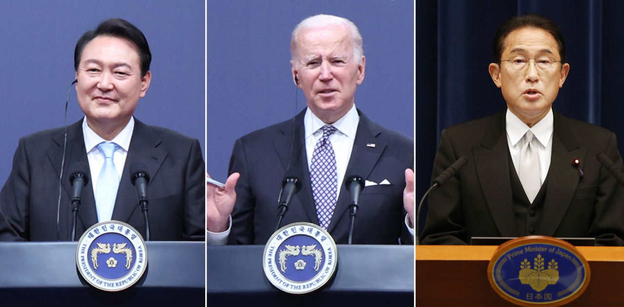 South Korean President Yoon Suk-yeol (L), US President Joe Biden (C ), and Japanese Prime Minister Fumio Kishida (R) will meet together for the first time in around five years on the sidelines of the upcoming NATO summit. (Yonhap)