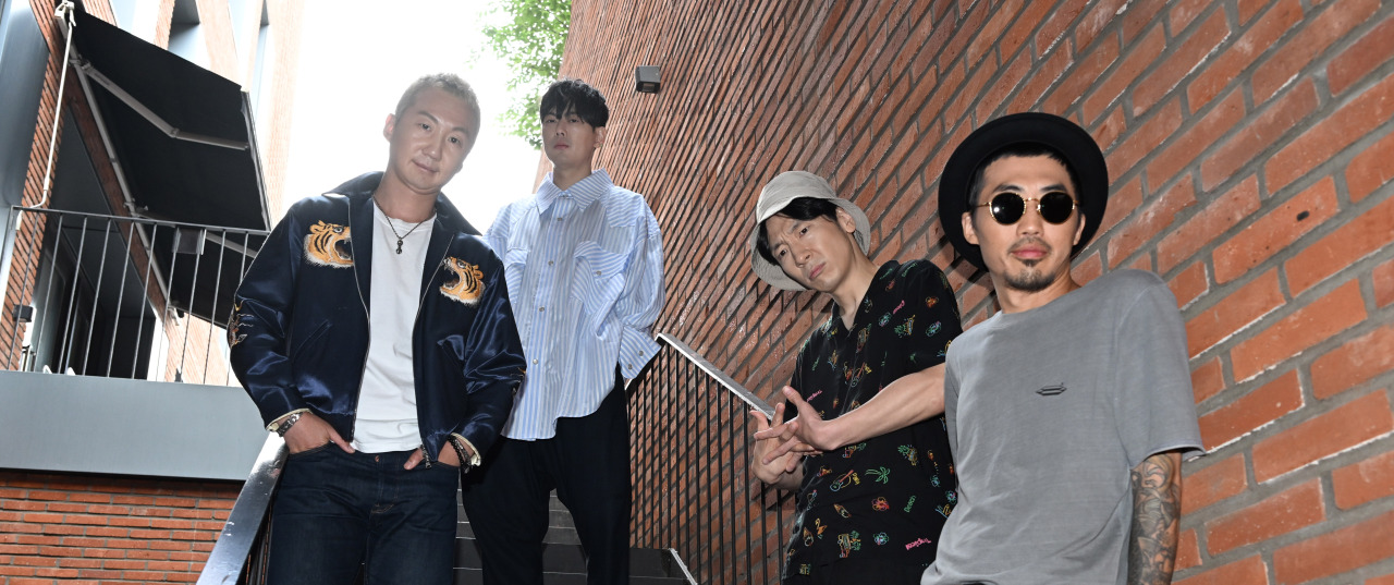 Legendary punk rock band No Brain poses for photos during an interview with The Korea Herald at The Korea Herald’s headquarters in Seoul, on Friday. (Im Se-jun/The Korea Herald)