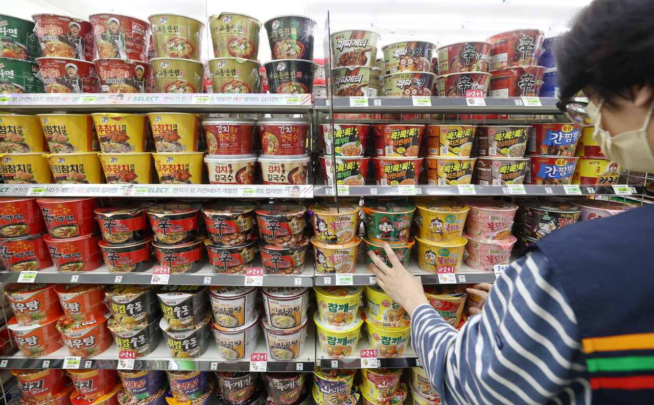 Instant noodles are stacked on shelves at a convenient store in Seoul, June 13. (Yonhap)