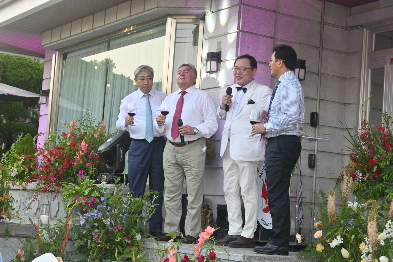Peruvian Ambassador to Korea, Matute-Mejia (second from left), and Invited Chair Professor of Graduate School of Public Health at Yonsei University, John Ryu (third from left), addressing guests at the inauguration reception of the COVID-19 Testing and Laboratory Capacity Building project at the Peruvian Ambassador’s residence in Yongsan-gu, Seoul, Saturday. (Sanjay Kumar/The Korea Herald)