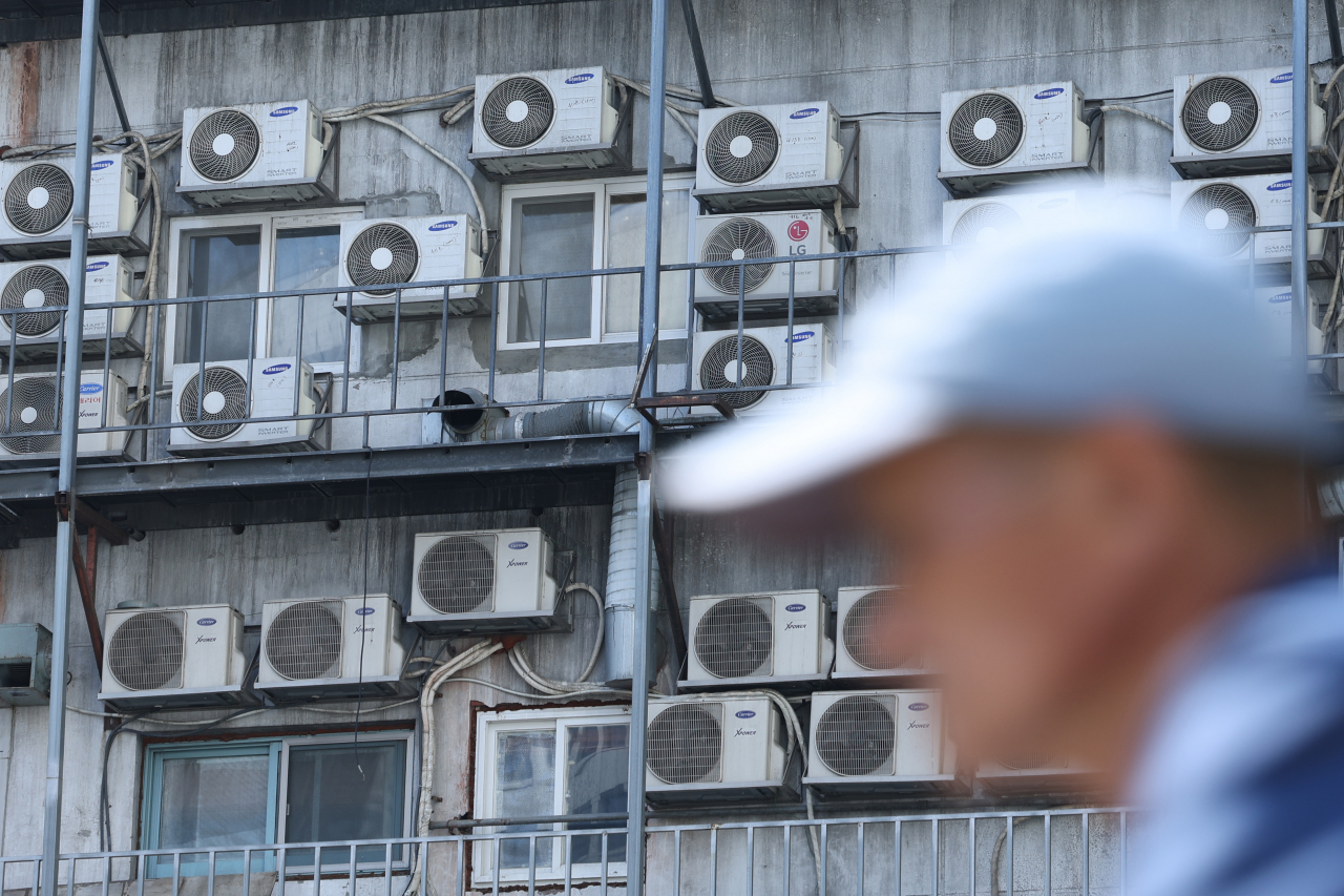 This undated file photo shows air conditioning condenser units outside a building in Seoul. (Yonhap)