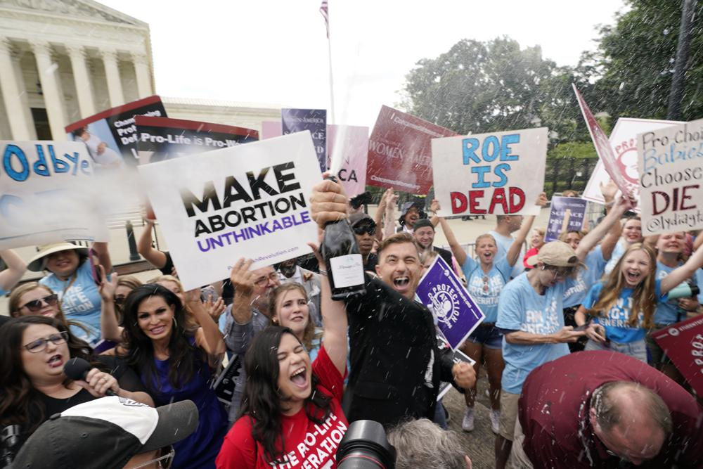 A celebration outside the Supreme Court, Friday, June 24, 2022, in Washington. The Supreme Court has ended constitutional protections for abortion that had been in place nearly 50 years — a decision by its conservative majority to overturn the court's landmark abortion cases. (AP)