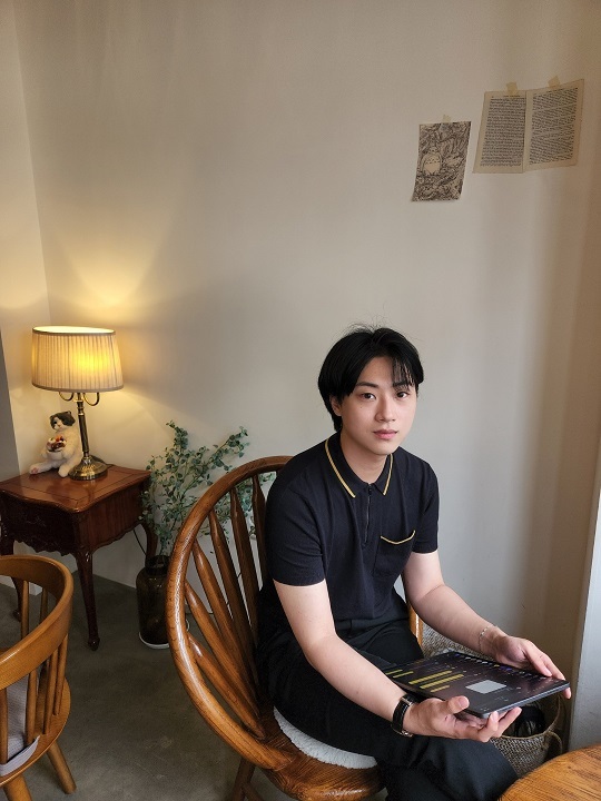 Choi Seung-hee, a 29-year-old transgender man and YouTuber, poses for a photo during an interview with The Korea Herald on July 5, in Bucheon, Gyeonggi Province. (Choi Jae-hee / The Korea Herald)