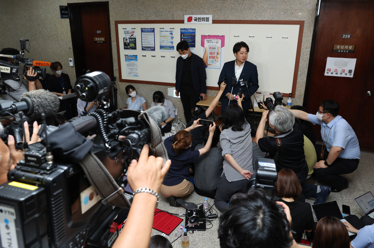 Lee Jun-seok, leader of the ruling People Power Party, speaks to reporters at the National Assembly in Seoul on July 7, 2022, after attending a meeting of the party`s ethics panel to discuss his fate over allegations of sexual bribery and a subsequent cover-up. (Joint Press Corps)