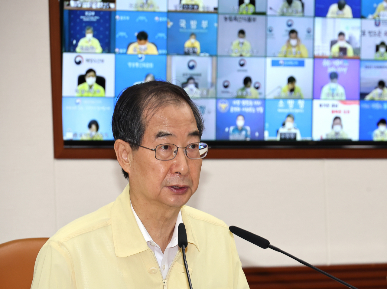 Prime Minister Han Duck-soo speaks during a meeting of the Central Disaster and Safety Countermeasures Headquarters about measures to deal with the coronavirus pandemic at the government complex in Seoul on Wednesday. (Yonhap)