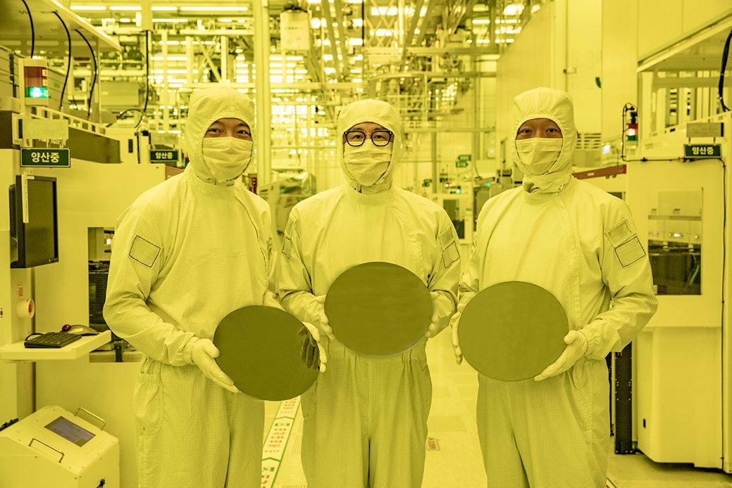 Chip engineers pose for a photo as Samsung Electronics announced plans for foundry's first 3-nanometer chip production in late June. (Samsung Electronics)