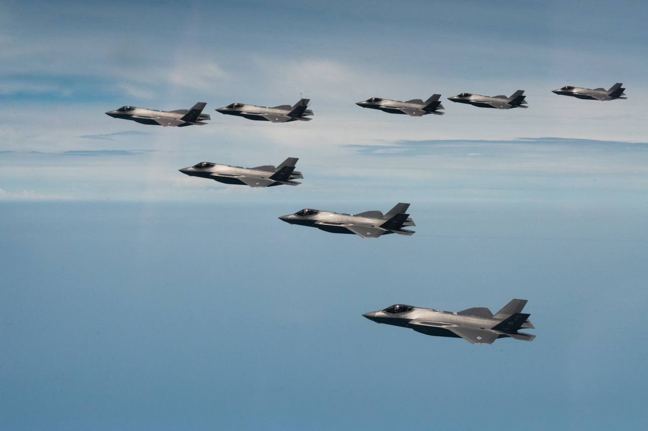 Eight F-35A fighters fly in formation during South Korea-US combined aerial drills, in this undated photo released Thursday by the South Korean Air Force. Seoul and Washington have conducted the four-day joint drills since Monday with F-35A stealth fighters for the first time. (Republic of Korea Air Force)