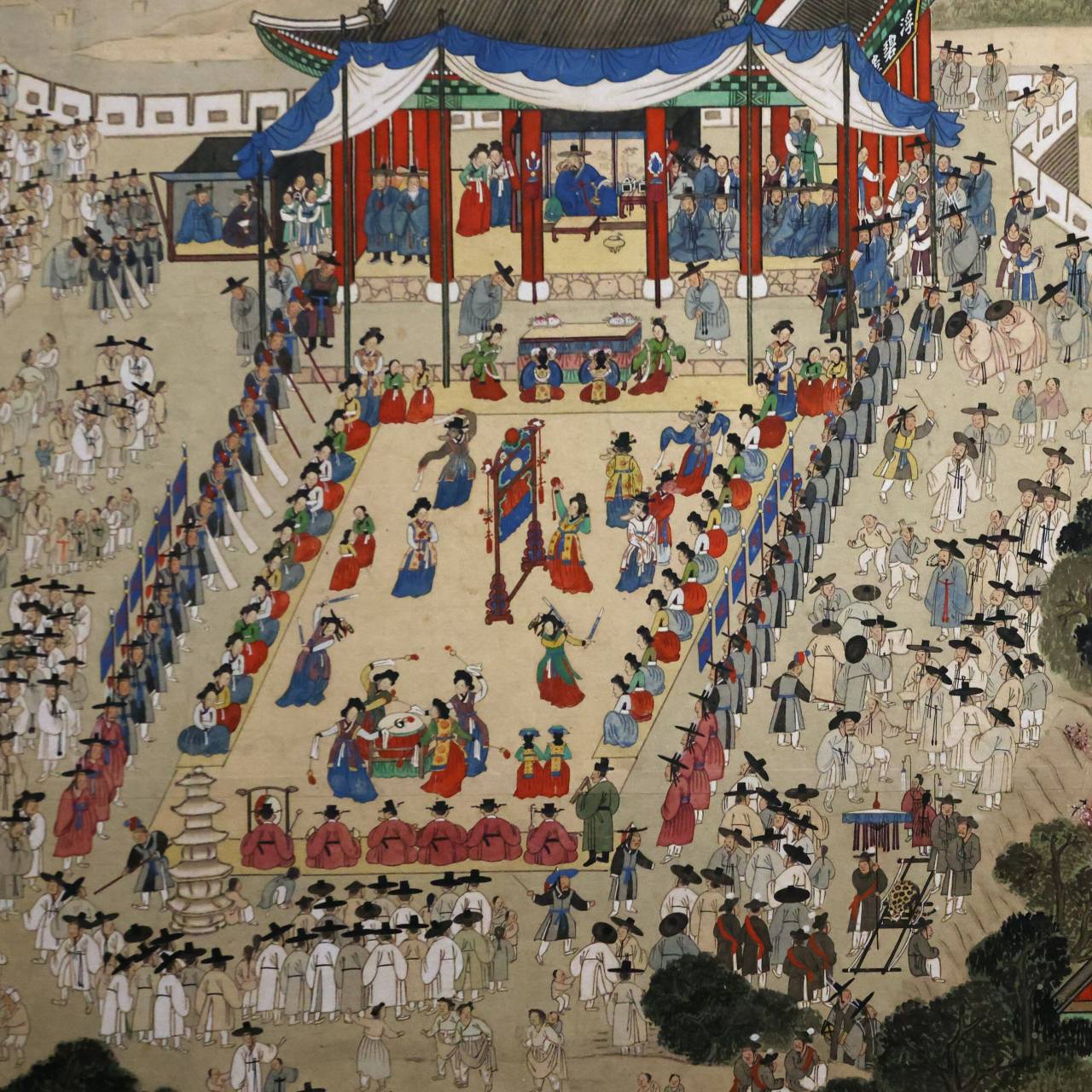 Entertainers perform in the Bubyeongnu yeonhoedo section of the “Welcoming Banquet for the Governor of Pyeongan” by Joseon painter Kim Hong-do (1745-1806) on display at the National Museum of Korea in Seoul.Photo © Hyungwon Kang