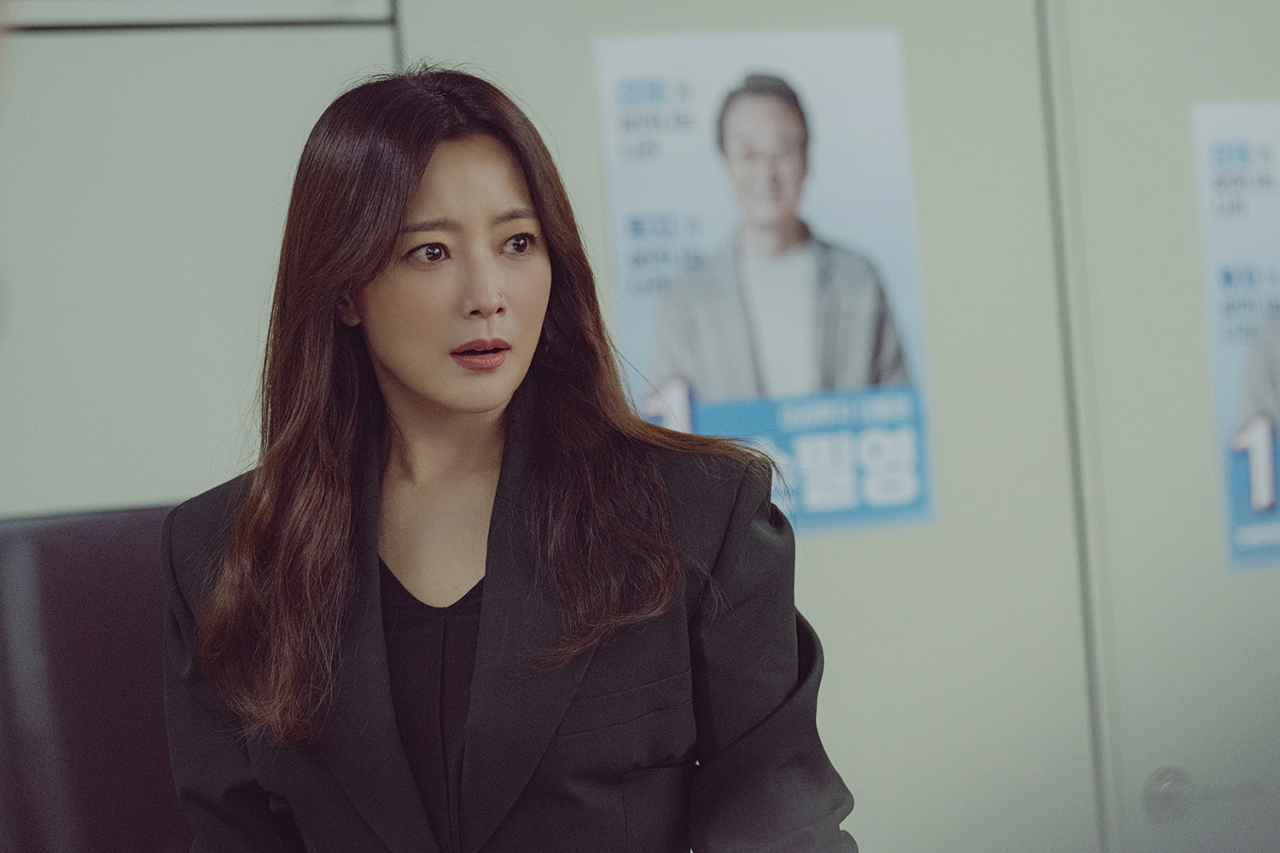 Kim Hee-seon plays Seo Hye-seung, a widow and teacher in “Remarriage & Desires.” (Netflix)