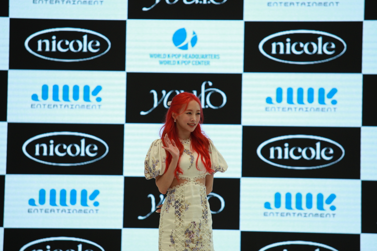 Nicole poses during a press conference for her new digital single “You.F.O” in Seoul on Tuesday. (JWK Entertainment)