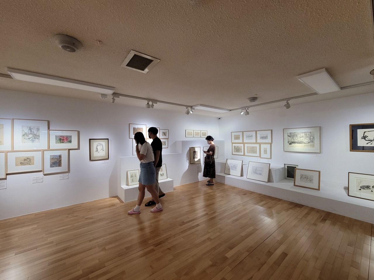 Visitors take a look at drawings at “Drawings from MMCA Collection, Special Storage” at MMCA Cheongju (Park Yuna/The Korea Herald)
