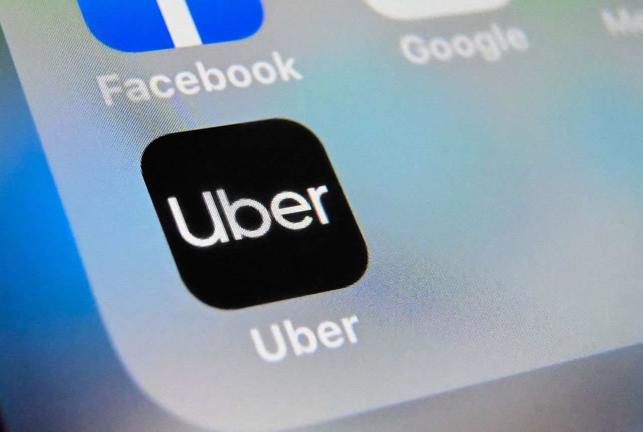 The logo of Uber app displayed on a tablet screen (AFP-Yonhap)