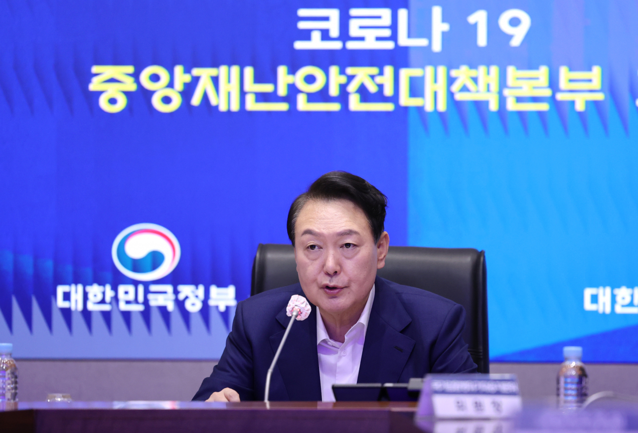 President Yoon Suk-yeol speaks during a meeting of the Central Disaster and Safety Countermeasures Headquarters about measures to deal with the coronavirus pandemic at the government complex in Seoul last Friday. (Yonhap)