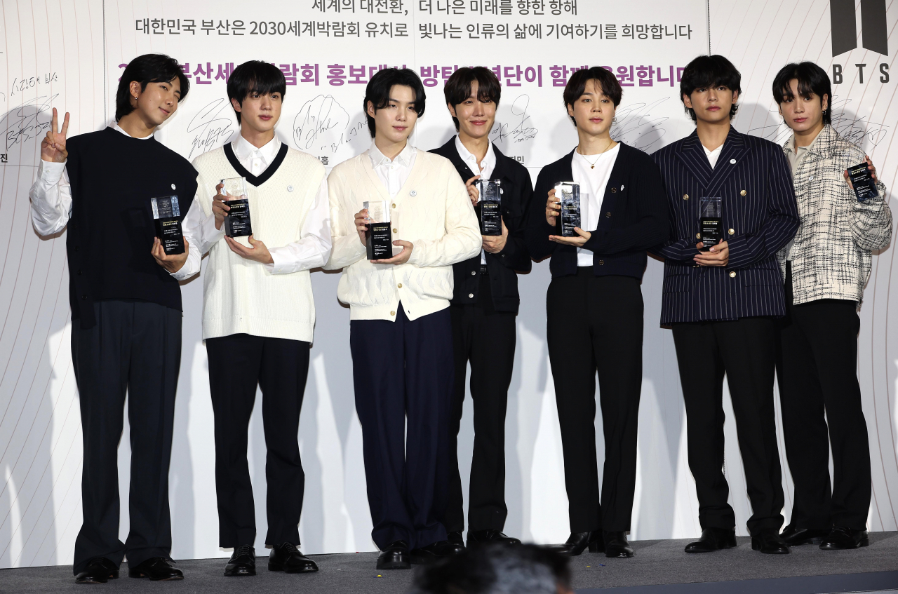 This July 19, 2022, file photo shows BTS posing for a photo after being appointed as honorary ambassador for the World Expo to be held in the southeastern port city of Busan in 2030. (Yonhap)