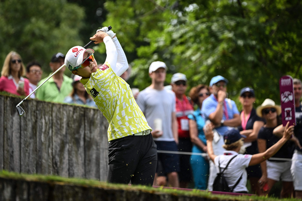 In this AFP file photo from July 23, 2022, Kim Hyo-joo of South Korea watches her shot during the third round of the Amundi Evian Championship at Evian Resort Golf Club in Evian-les-Bains, France. (AFP)