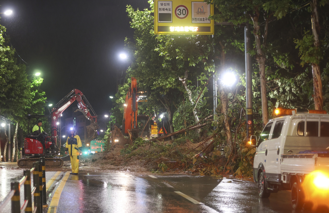 Heavy overnight rain caused a landslide in Seocho-gu, southern Seoul on Tuesday morning. (Yonhap)