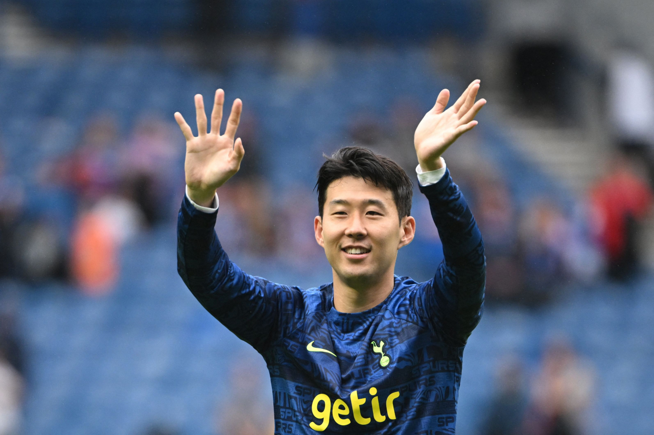 In this AFP file photo from July 23, Son Heung-min of Tottenham Hotspur greets fans after a preseason friendly match against Rangers at Ibrox Stadium in Glasgow. (AFP)