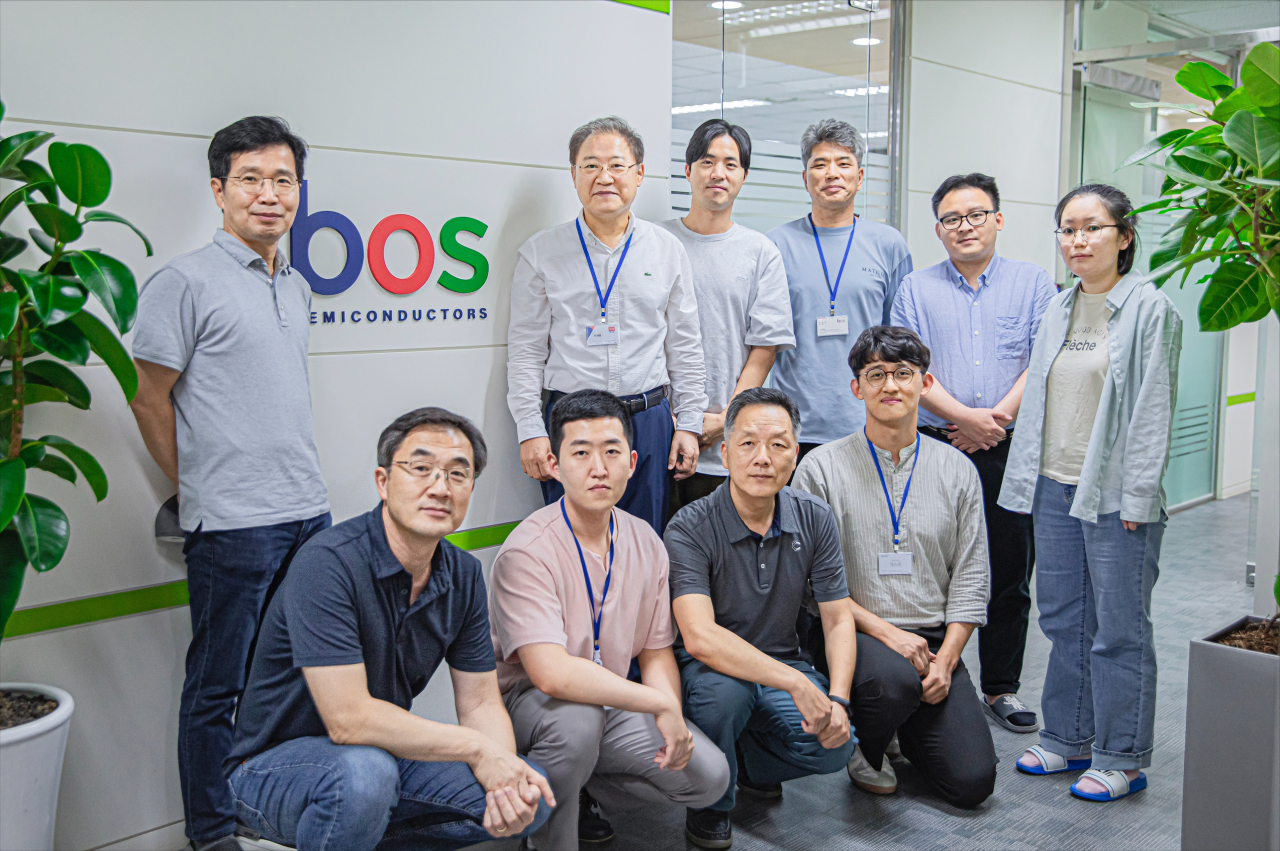 Officials from Bos Semiconductors pose for a photo at the Bos Semiconductor headquarters in Pangyo, Gyeonggi Province. (Hyundai Motor)