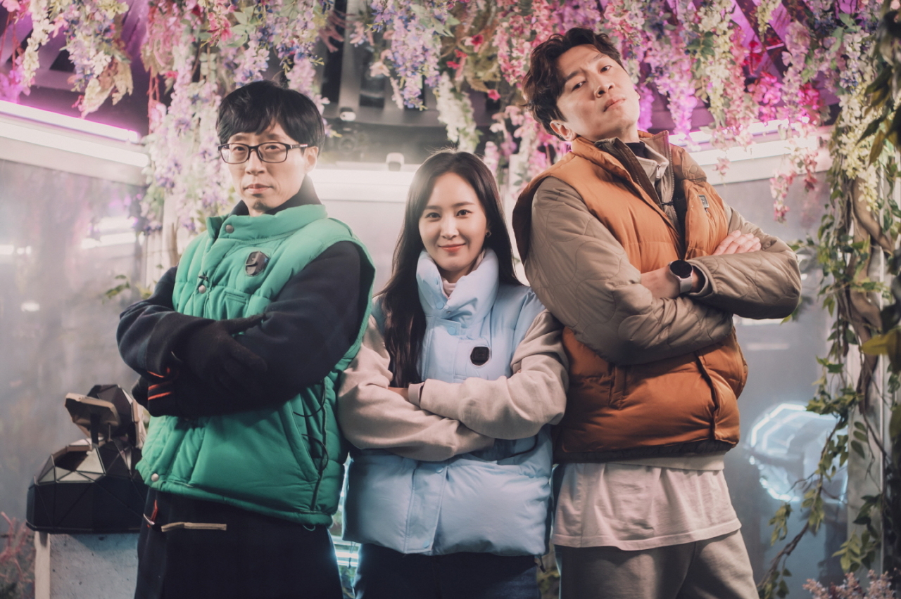 From left: Comedian Yoo Jae-suk, singer and actor Kwon Yuri and actor Lee Kwang-soo pose for photo in “The Zone: Survival Mission” (Walt Disney Co. Korea)