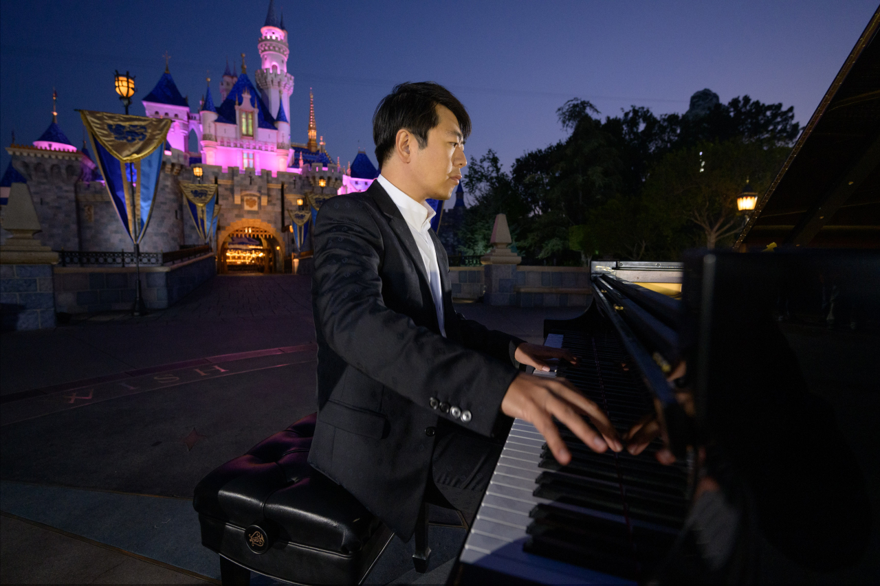 Pianist Lang Lang performs at Disneyland Park in California. (Richard Harbaugh)