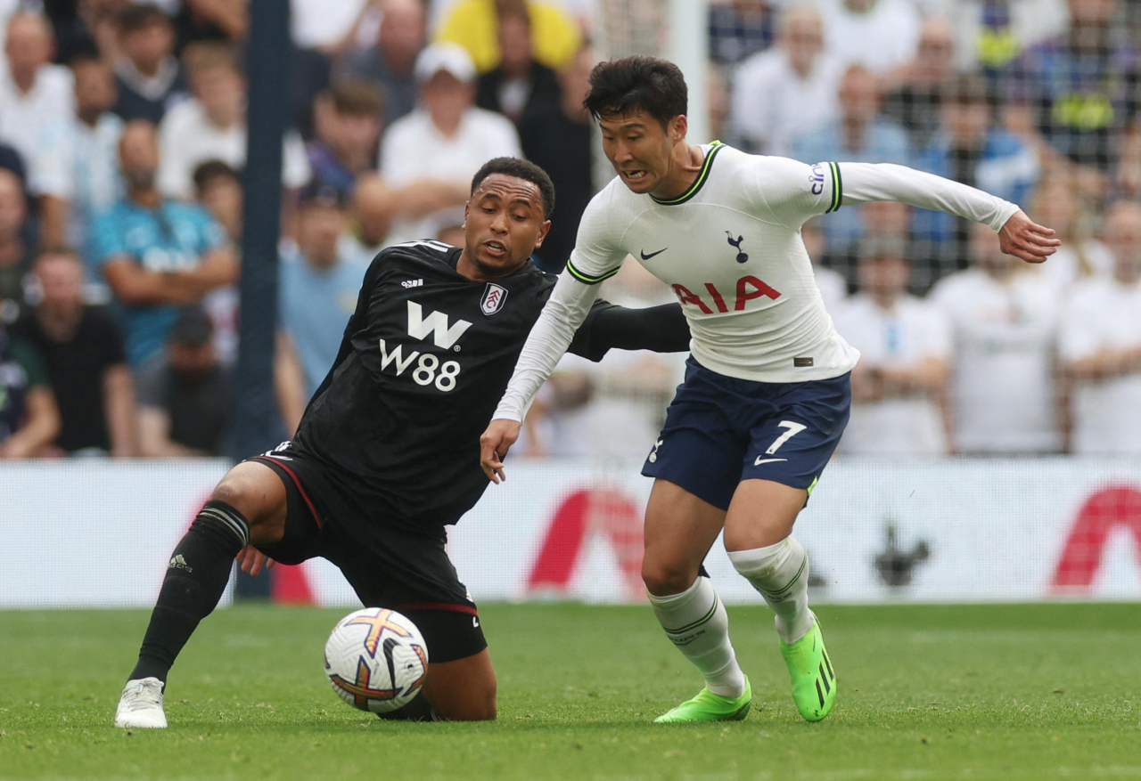 In this Action Images photo via Reuters, Son Heung-min of Tottenham Hotspur (R) tries to hold off Kenny Tete of Fulham FC during the clubs' Premier League match at Tottenham Hotspur Stadium in London onSaturday. (Yonhap)