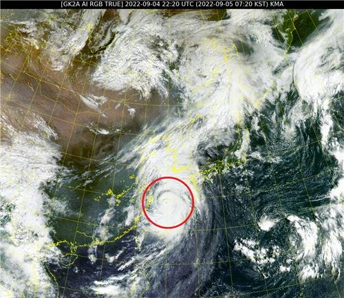 In this image taken by South Korea's geostationary satellite, Chollian-2A, at 7:20 a.m. on Monday, and released by the National Meteorological Satellite Center, Typhoon Hinnamnor is seen moving northward near the country's largest island of Jeju. (National Meteorological Sataellite Center)