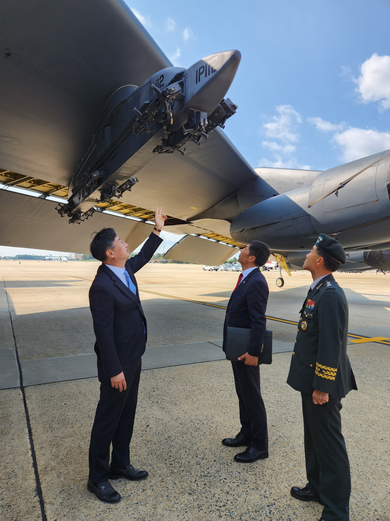 South Korean Vice Defense Minister Shin Beom-chul (L) looks at a B-52 strategic bomber at Joint Base Andrews outside Washington, D.C., on Friday, in this photo released by Seoul's defense ministry. (Defense Ministry)