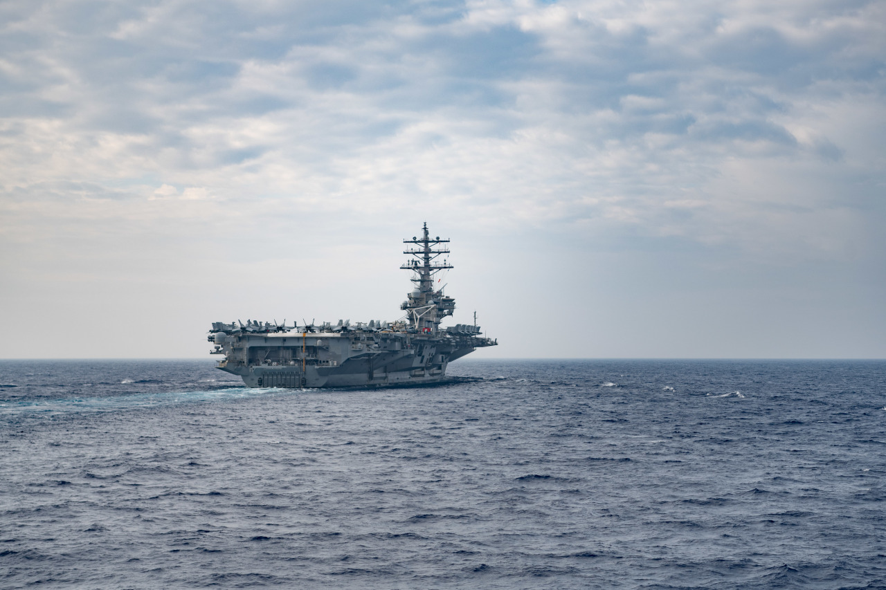 The Nimitz class aircraft carrier USS Ronald Reagan (CVN 76) conducts routine operations in the Philippine Sea in May 2020. Ronald Reagan is forward-deployed to the U.S. 7th Fleet area of operations in support of security and stability in the Indo-Pacific region. (File Photo - US Navy)