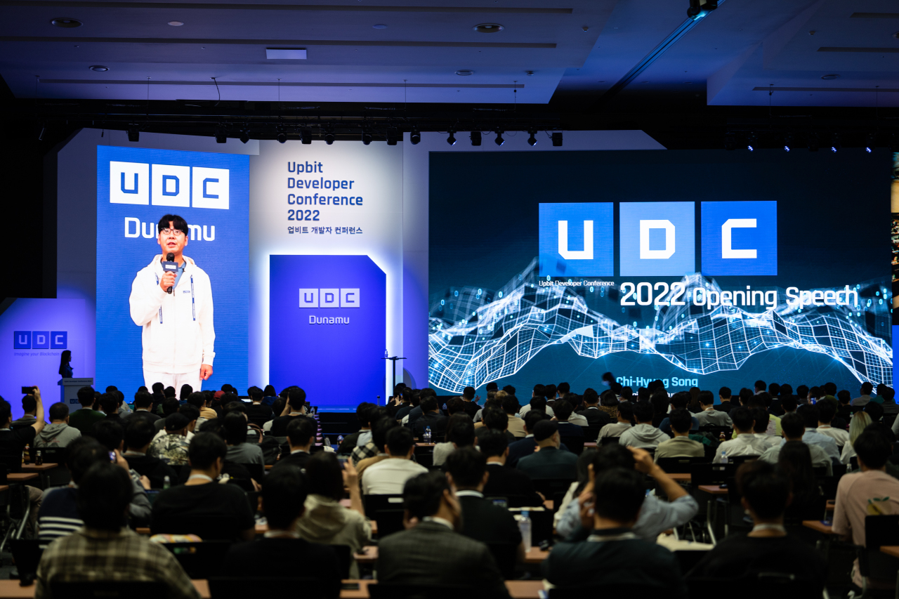 Dunamu Chairman Song Chi-hyung makes an opening speech at the 2022 UDC in Busan on Thursday. (Dunamu)