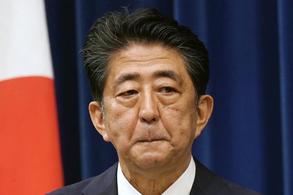 Japanese Prime Minister Shinzo Abe reacts during a press conference at the prime minister official residence in Tokyo on Aug. 28, 2020. Japan's Cabinet on July 22, formally decided to hold a state funeral on Sept. 27 for the assassinated former Prime Minister Abe, amid national debate over the plan which some criticize an attempt to glorify a divisive political figure. (Franck Robichon/AP)