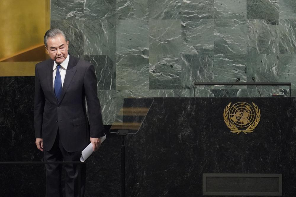 Foreign Minister of China Wang Yi acknowledges the audience applause after addressing the 77th session of the United Nations General Assembly, Saturday at UN headquarters. (AP Photo/Mary Altaffer)