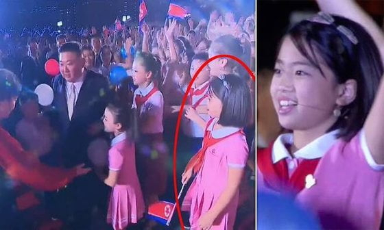 This screengrab of North Korea's celebrations of its 74th founding anniversary, broadcast on Korea Central News Agency, shows a child speculated to be the only daughter of North Korean Kim Jong-un. (Korea Central News Agency)