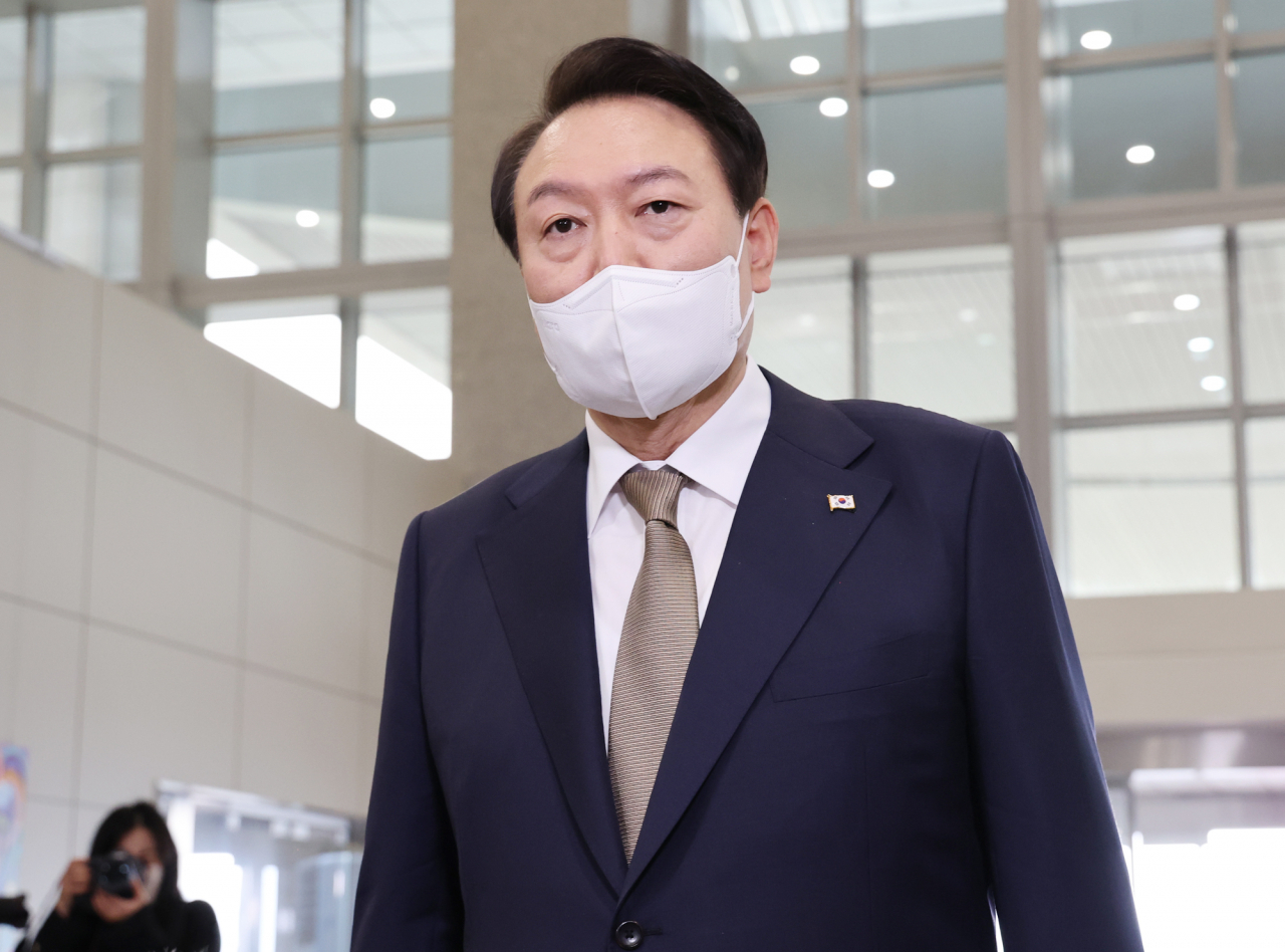 President Yoon Suk-yeol speaks to reporters as he arrives at the presidential office in Seoul on Thursday (Yonhap)