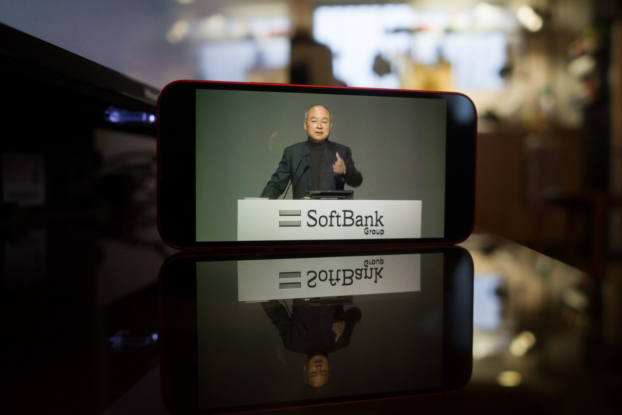 Masayoshi Son, chairman and chief executive officer of SoftBank Group Corp., speaking in Tokyo during a virtual earnings announcement, arranged in Naha, Japan, in February. (Bloomberg)