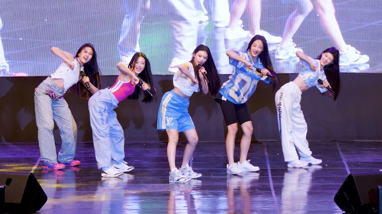 Rookie K-pop girl group NewJeans performs on stage at Dankook University’s fall festival held on Sept. 21. (Twitter)