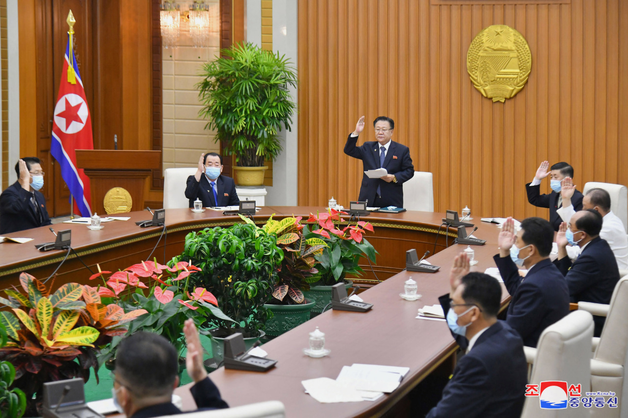 A plenary session of the standing committee of North Korea's Supreme People's Assembly takes place at the Mansudae Assembly Hall in Pyongyang on Aug. 7, with Chairman Choe Ryong-hae (standing) presiding. (KCNA)