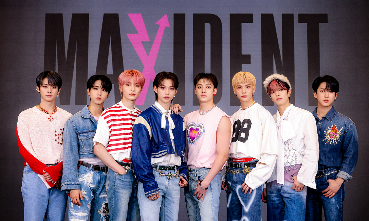 Boy band Stray Kids pose during an online press conference held for their new album, “Maxident,” on Friday. (JYP Entertainment)