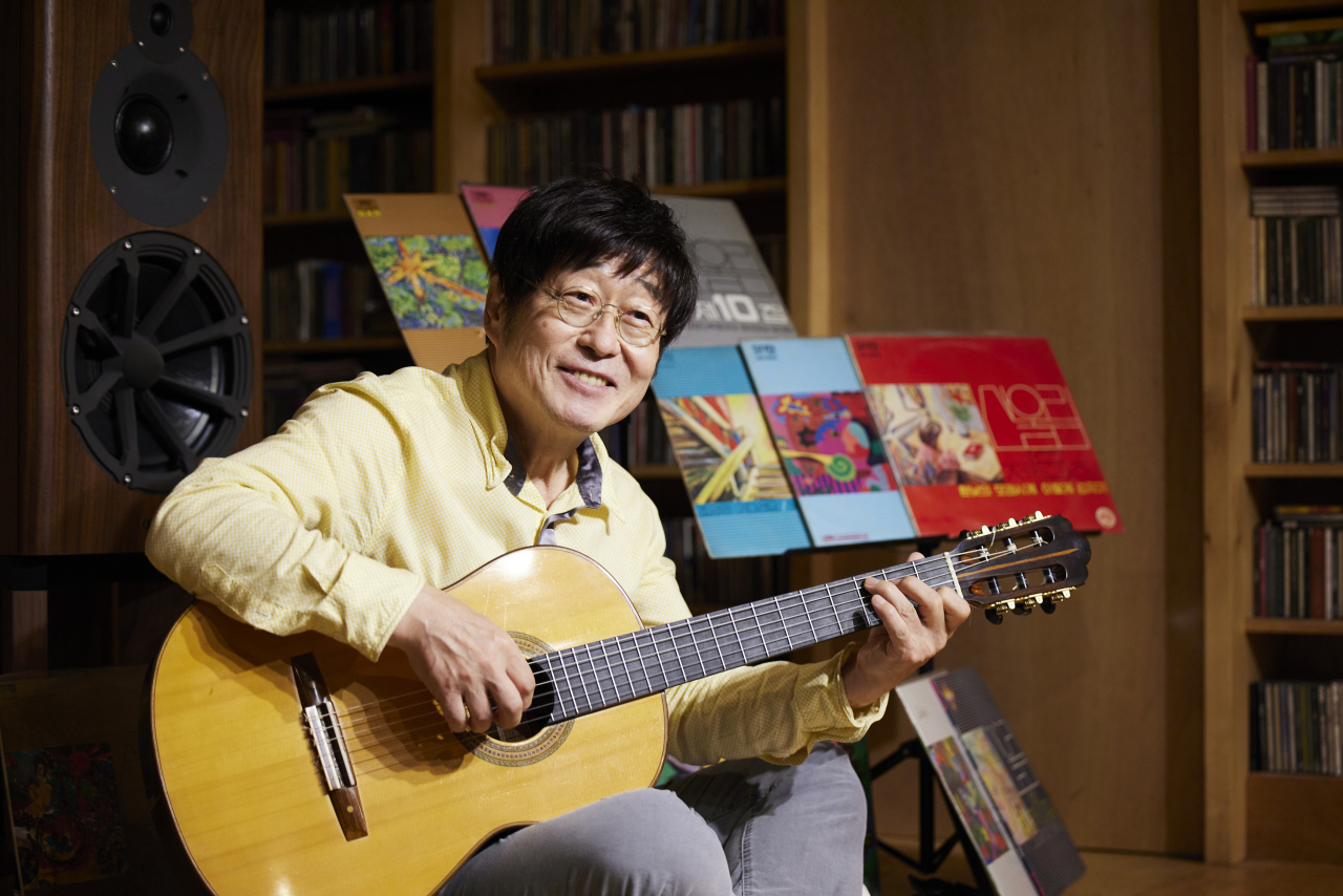 Singer-songwriter Kim Chang-wan poses during Sanullim's 45th anniversary remaster project press conference held in Seoul on Thursday. (Music Bus)