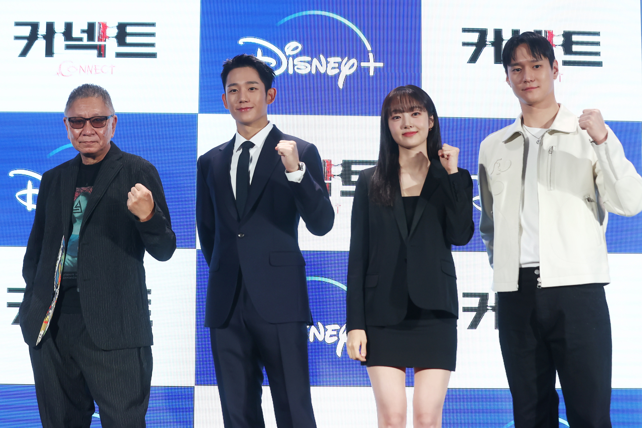 From left: director Takashi Miike, actors Jung Hae-in, Kim Hye-jun and Go Kyung-pyo pose for photos before a press conference held at Grand Josun Busan on Friday (Yonhap)