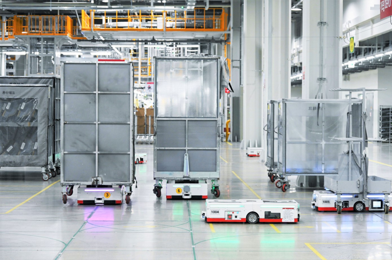 Automated guided vehicles carry loads at LG Smart Park production center (LG Electronics)